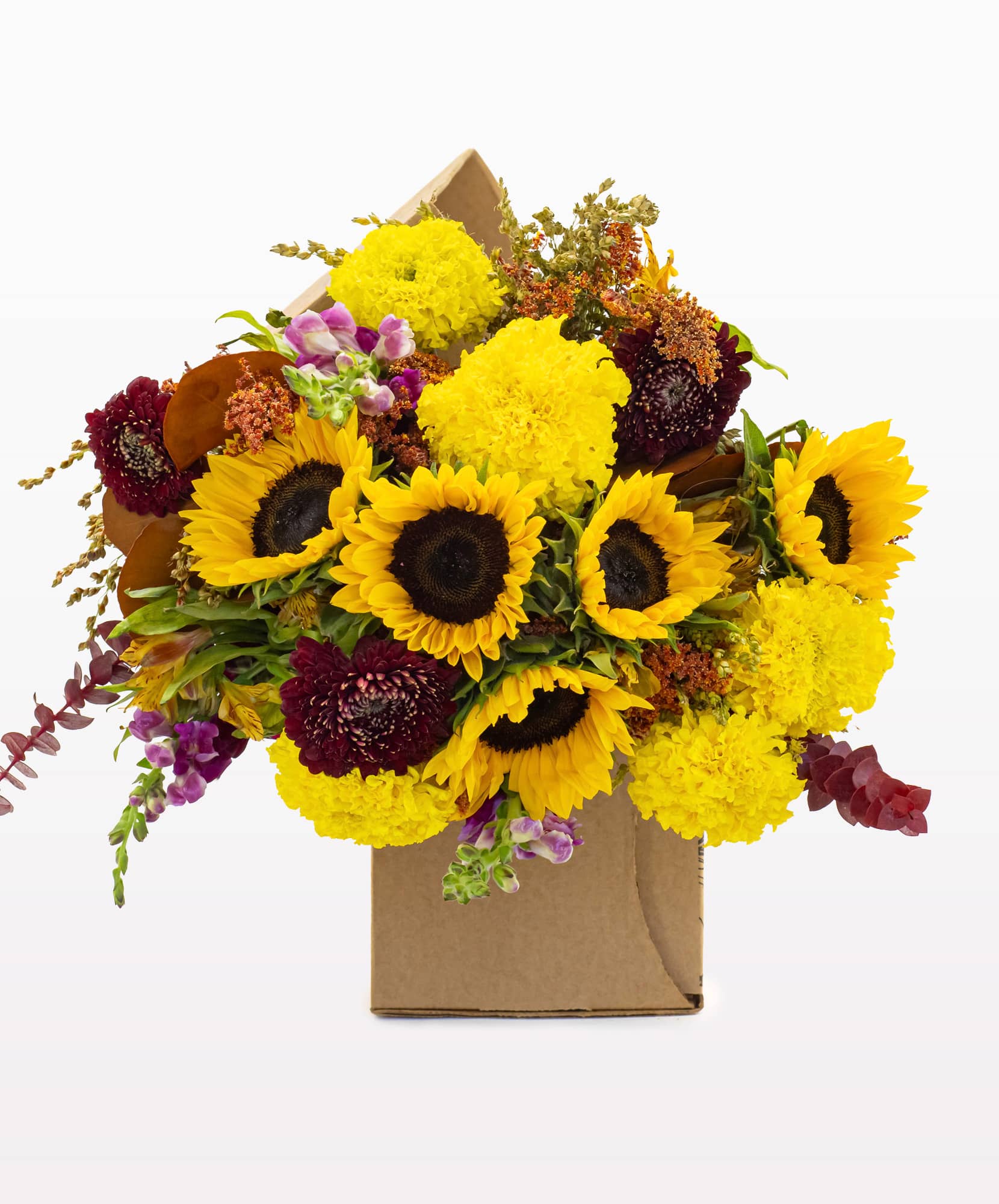 Bright sunflower and marigold bouquet, elegantly arranged for cheerful celebrations.